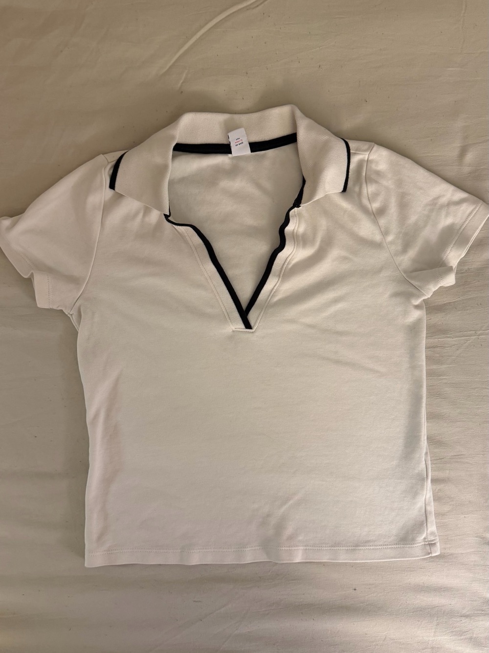 Women’s White Polo V-Neck Top with Black Trim